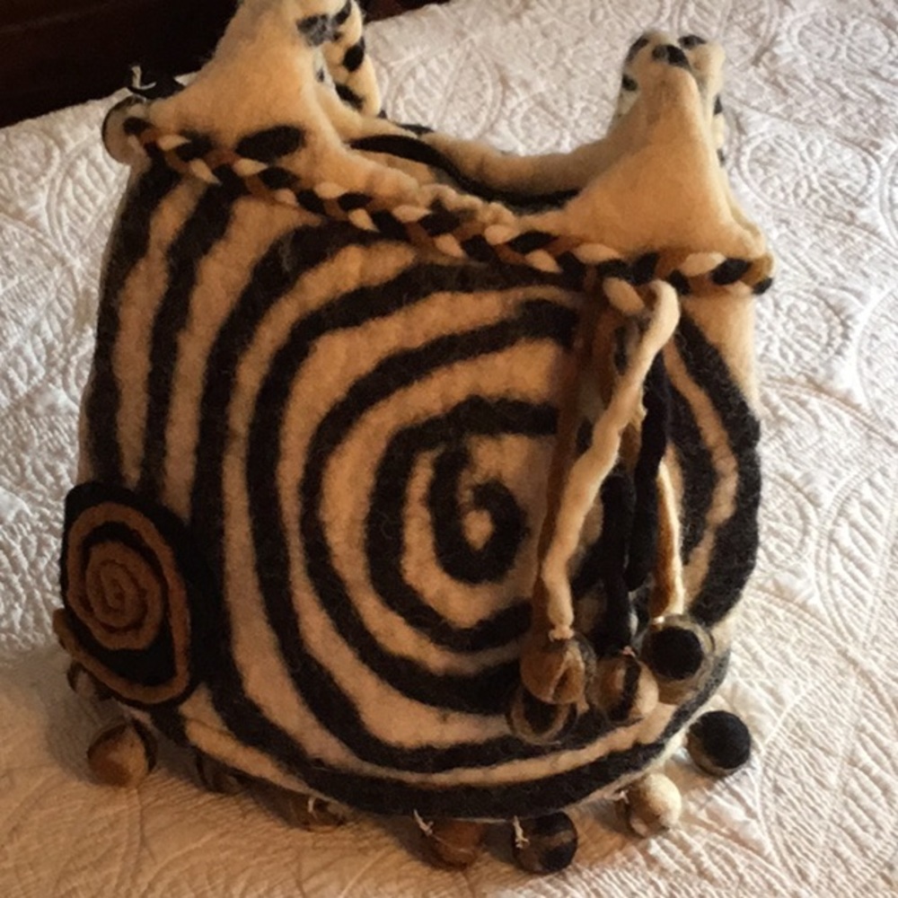 This is a vintage purse I have loved but need to make room in closet.